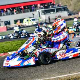 Race action in front of Whilton Mill's clubhouse